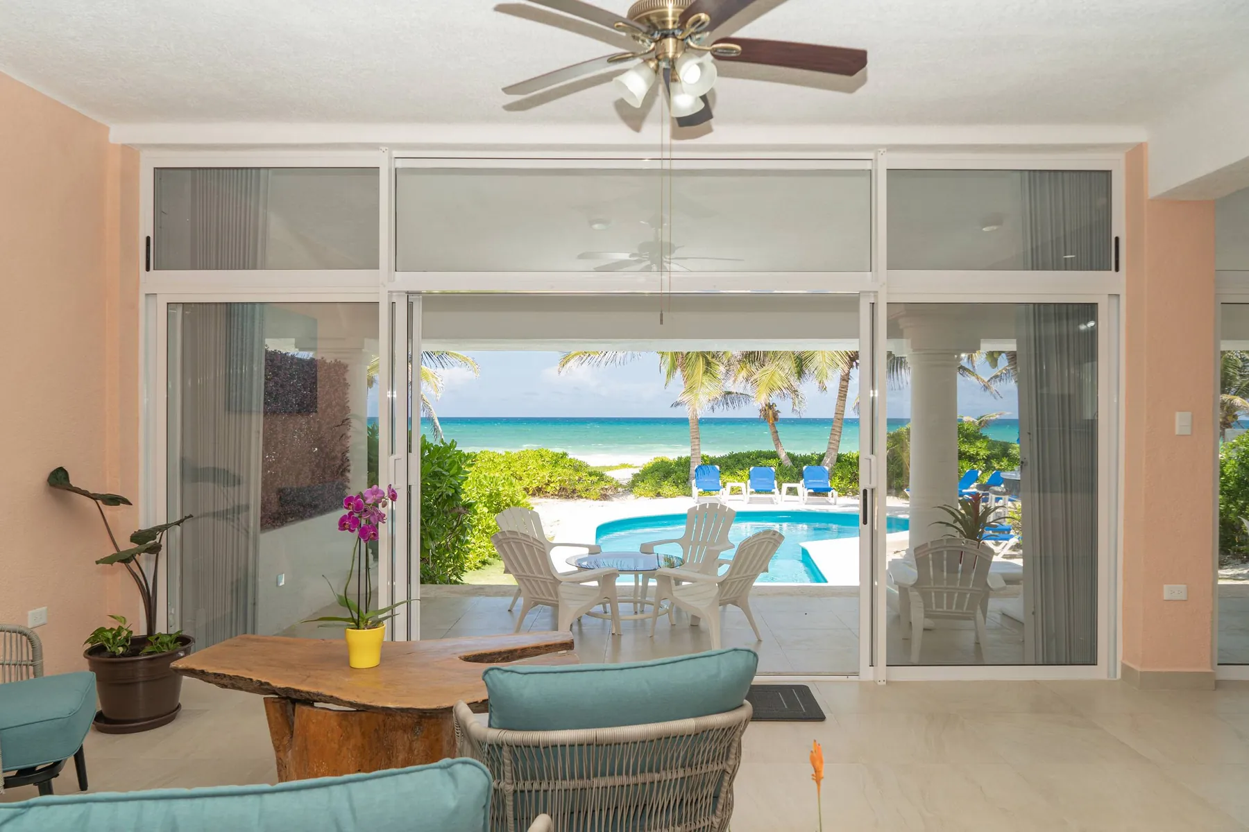 Living room opening onto the pool